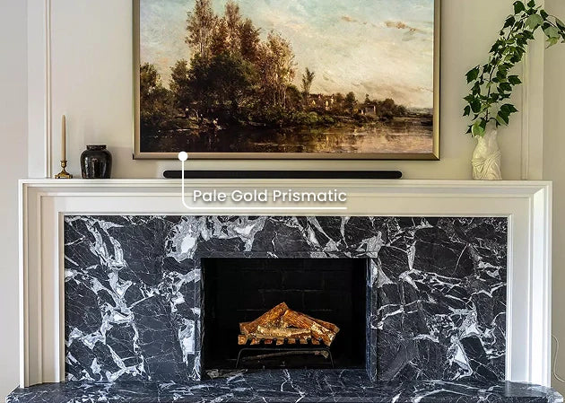 A Samsung Frame TV hangs over a fireplace in a modern design living room.