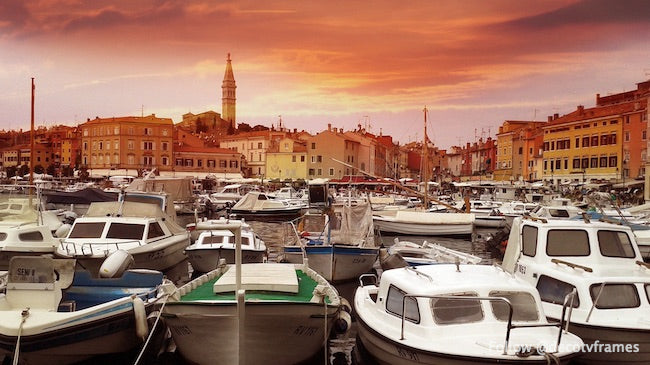 White Yachts on Body of Water during Sunset
